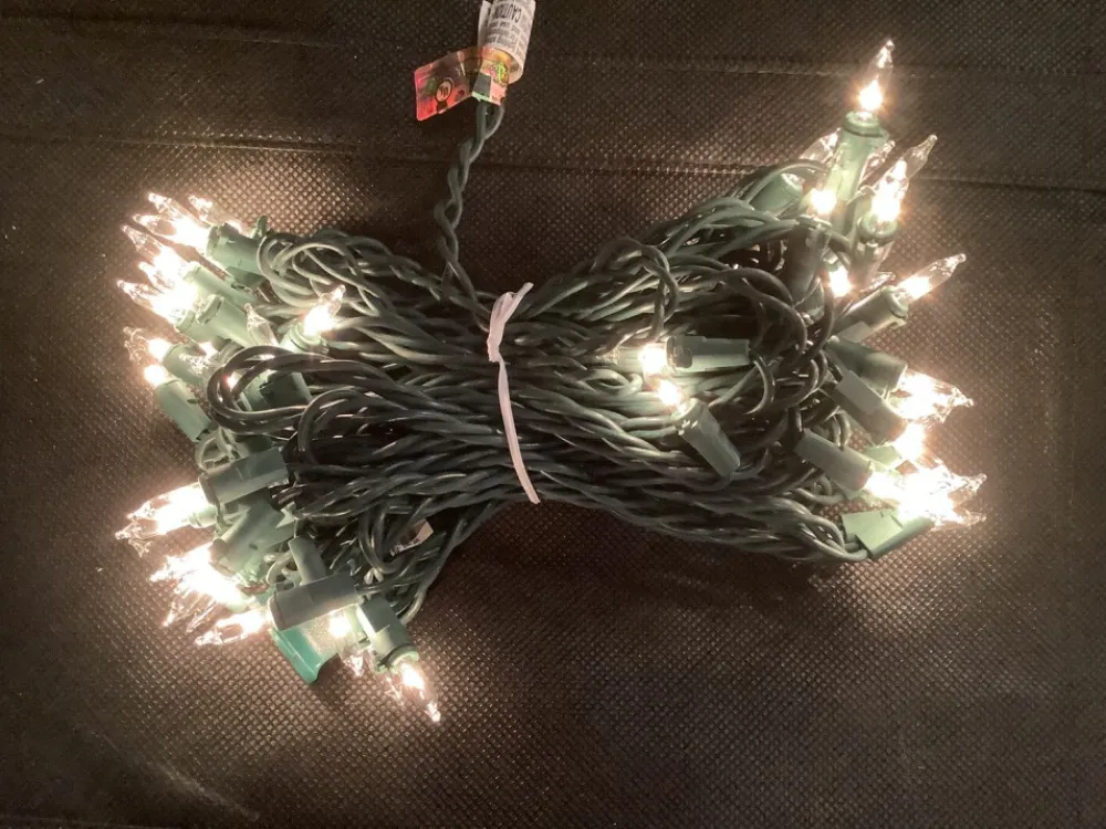 clear_white_incandescent__light_set_green_wire_0.webp Flash Sale A Christmas Clear White Incandescent 100 Light Set, Green Wire